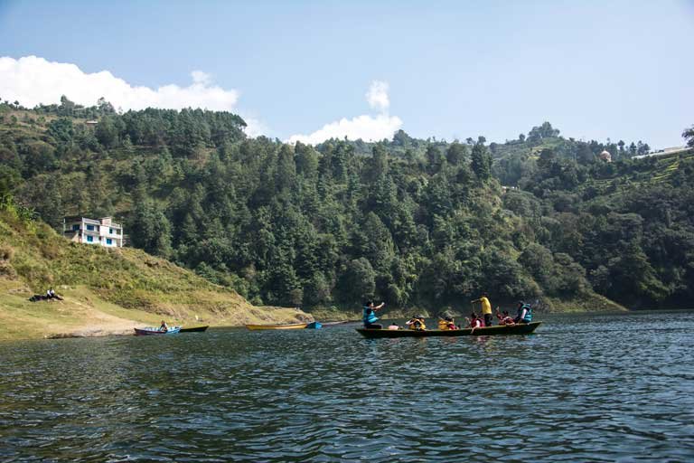 Local tourists boating at Indra Sarovar, water reservoir at Kulekhani. 