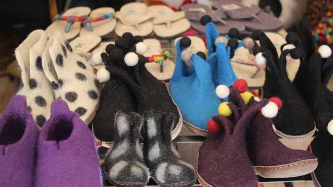 Shopping items like shoes, slippers in display at a shop in tourist area in Kathmandu, Nepal. 