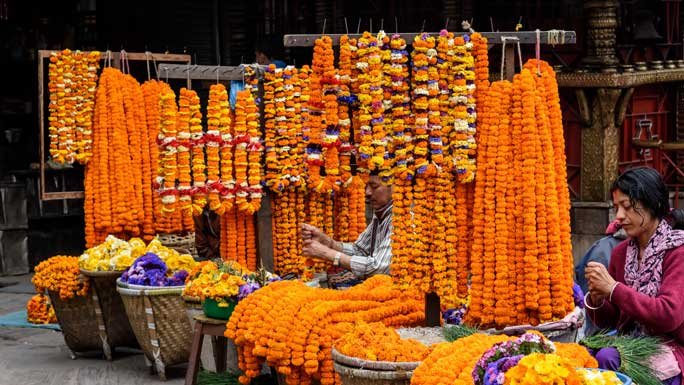 Market places are decorated with flowers during Tihar. 